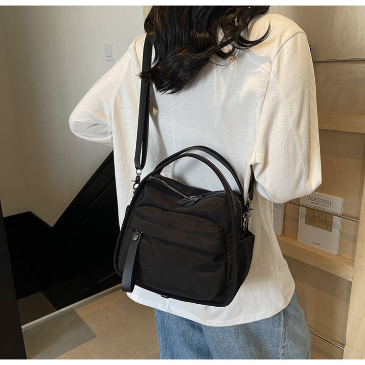 Fashionable shoulder bag with innovative structure and detachable carrying strap Kalsten