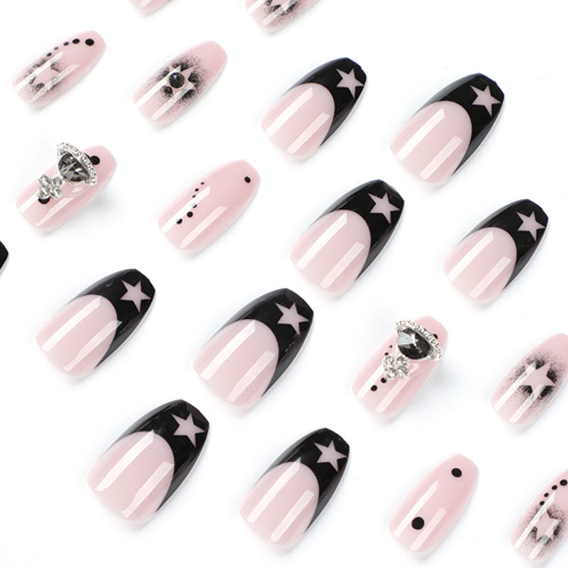 Glamorous nail art with star motifs and glitter accents Kalsten