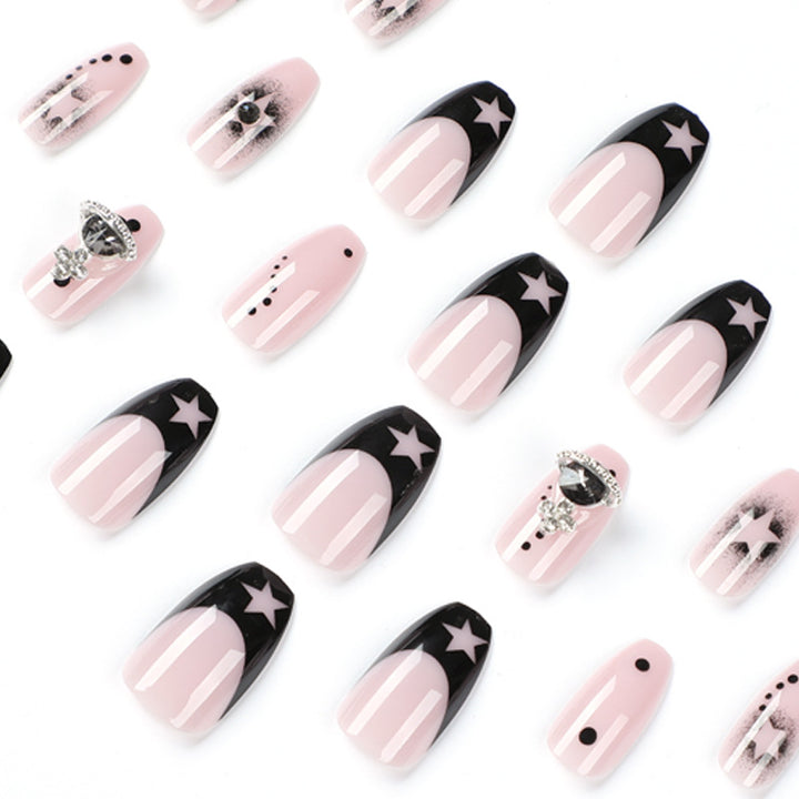 Glamorous nail art with star motifs and glitter accents Kalsten