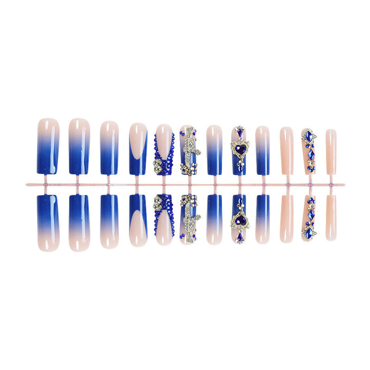 Acrylic nail set with elegant ombre design and sparkling embellishments Kalsten