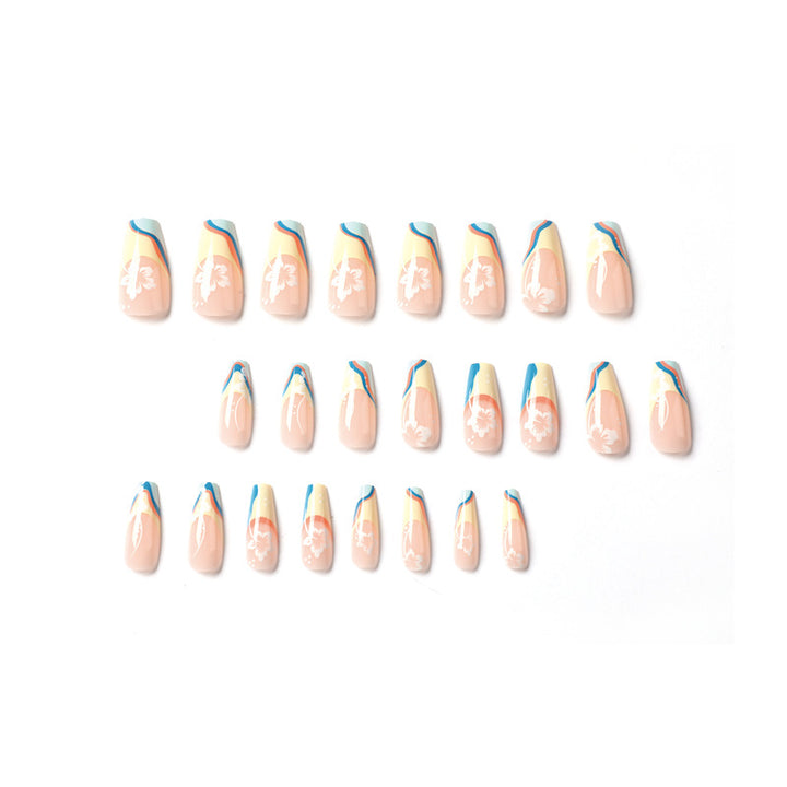 Artistic nail art with floral accents and creative color layers Kalsten
