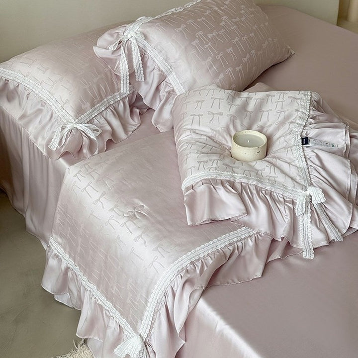 Satin bedding set with jacquard bow relief, gathered ruffle and lace trim