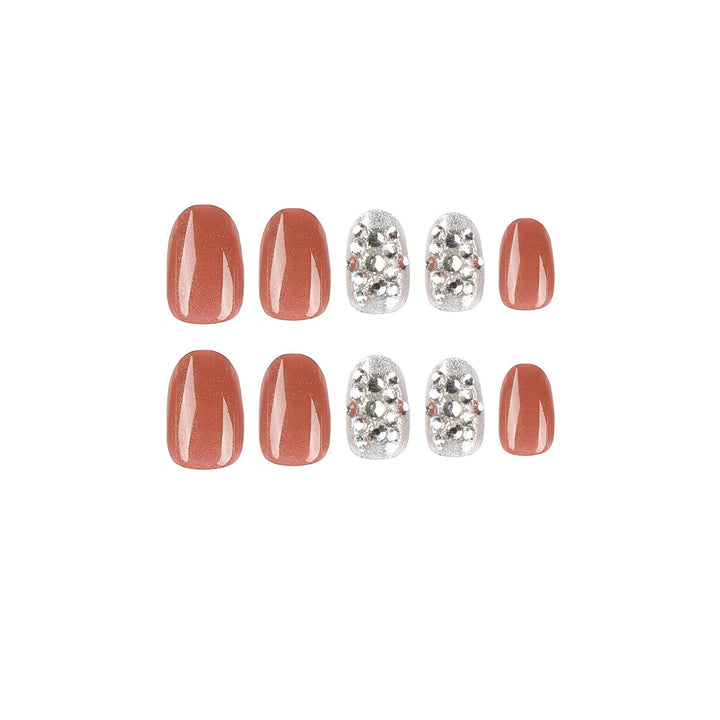 Artistic acrylic nails with glitter accents Kalsten