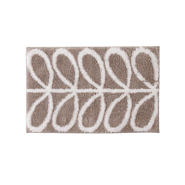 Fluffy bath mat in a graphic wave relief with anti-slip base Kalsten