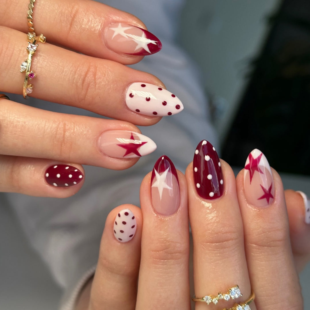 Artful Nail Art with Flower Design and Blue French Tip Kalsten