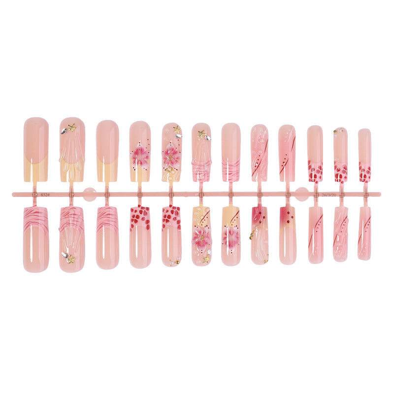 Artificial nails with elegant flower and glitter designs Kalsten
