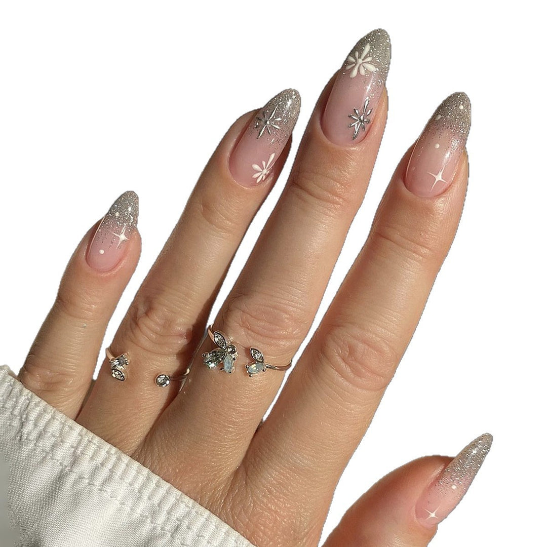 Nail art set with elegant glitter French design and artistic embellishments Kalsten