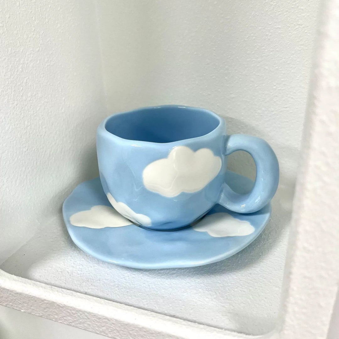 Ceramic mug with hand-painted tulip pattern and organic shape
