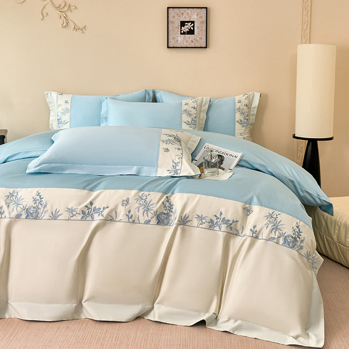Luxurious bedding set with embroidered border and satin look