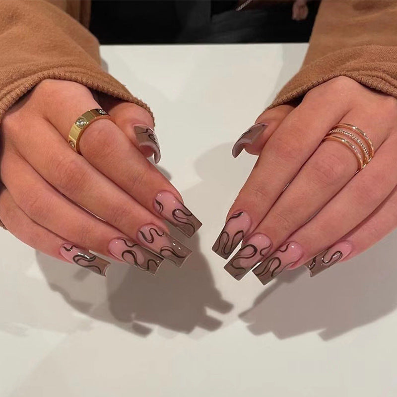 Artful Gel Nails with Elegant Floral Design and Glitter Accents Kalsten