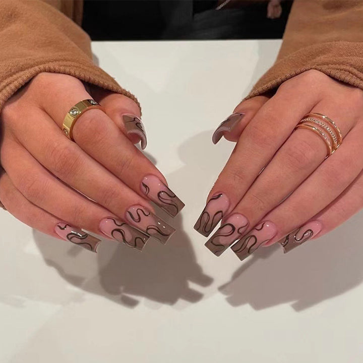 Artful Gel Nails with Elegant Floral Design and Glitter Accents Kalsten