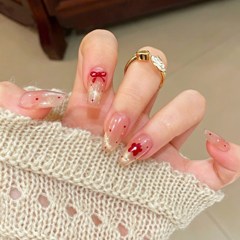 Artificial nails with sparkling accents and delicate patterns Kalsten