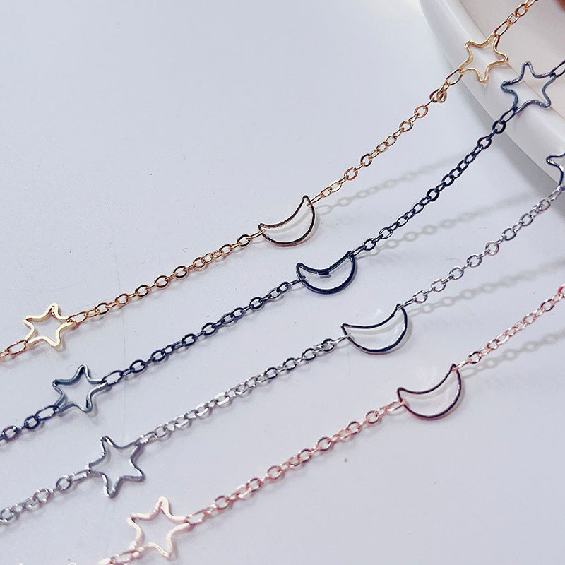 Fashionable glasses holder chain with star and moon motifs Kalsten