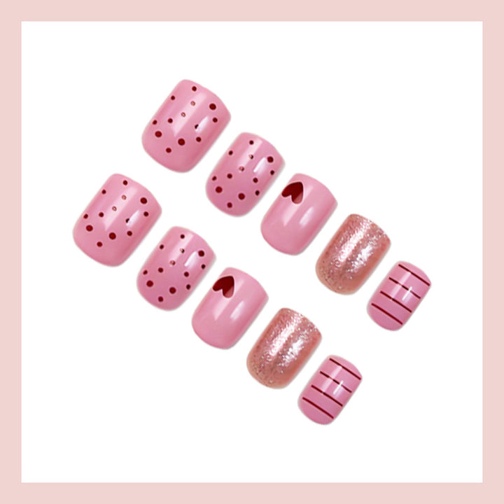 Acrylic nail set with playful hearts and glitter accents Kalsten
