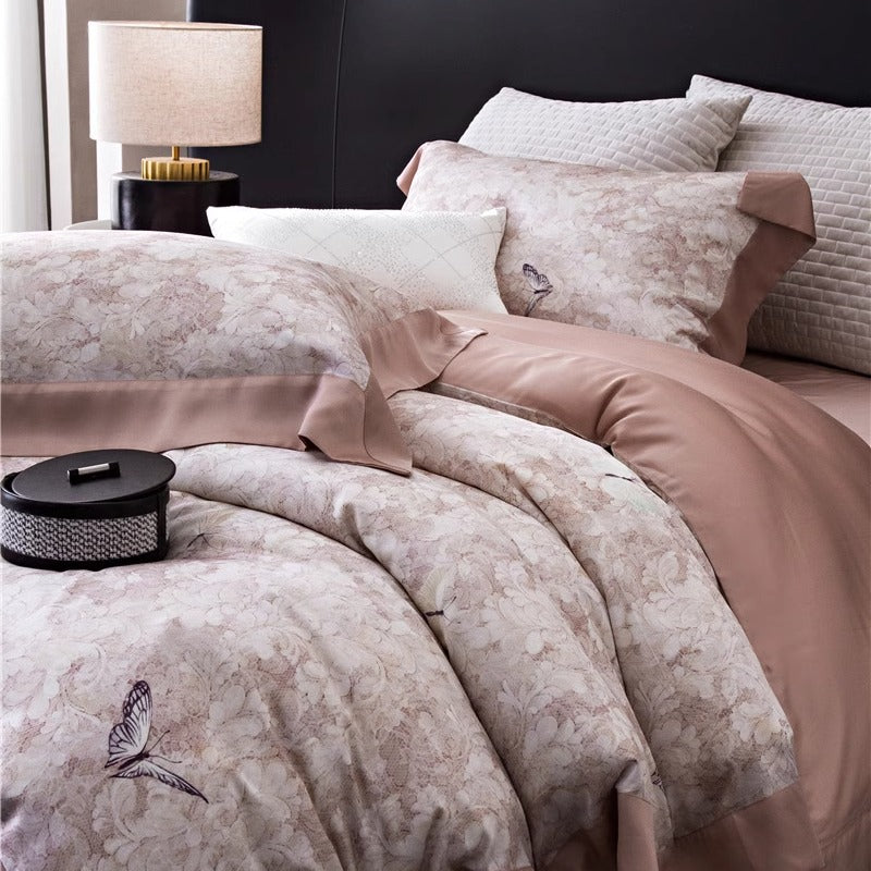 Duvet cover set made of cotton satin with subtle watercolor flower print and silky-matte texture