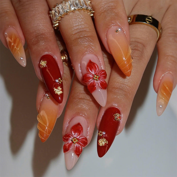 Acrylic nail set with elegant floral design and shimmering accents Kalsten