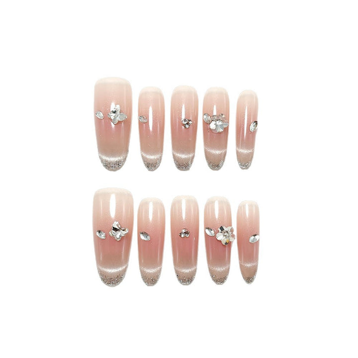 Glamorous artificial nails with glitter decorations Kalsten