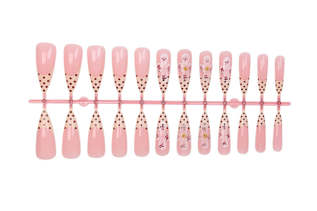 Art nail set with elegant flower and dot designs Kalsten