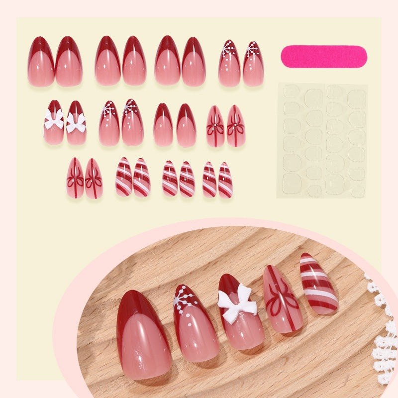 Art nail set with festive design, charming decorations, and glitter accents Kalsten