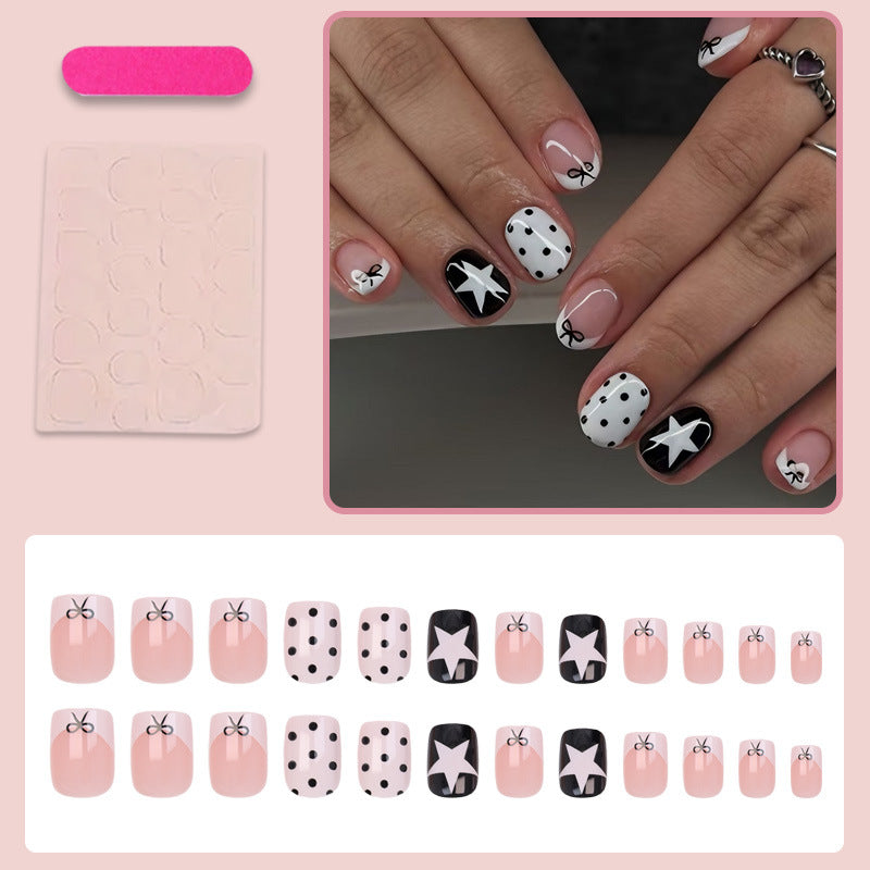 Acrylic nail set with playful dots and star motifs Kalsten