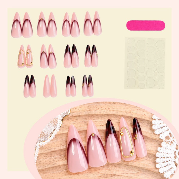 Acrylic nail set with elegant ombre design and golden accents Kalsten