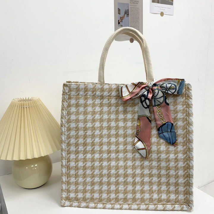Elegant Houndstooth Handbag with Decorative Bow