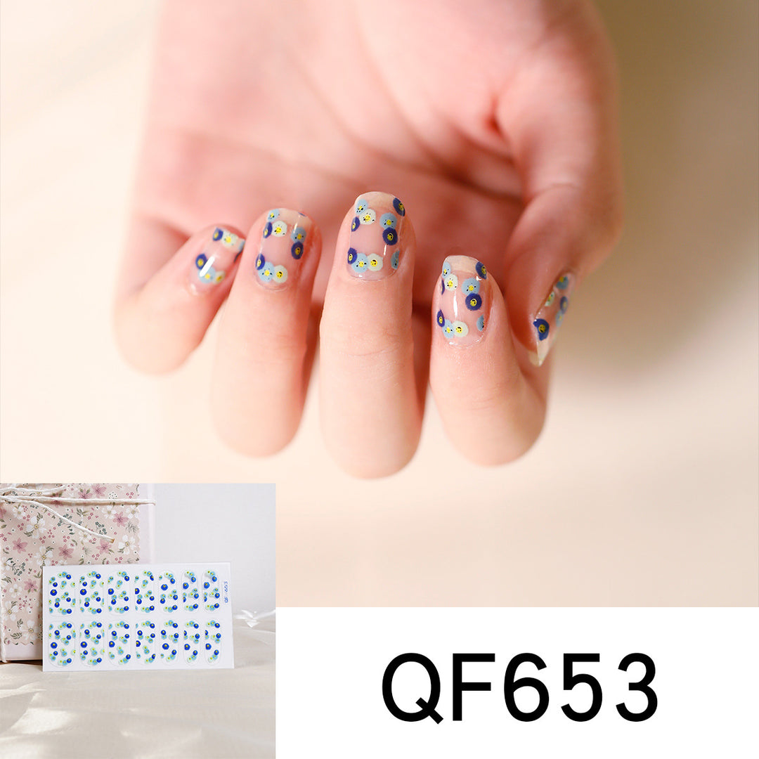 Artificial nail art with heart-shaped designs and soft color gradients Kalsten