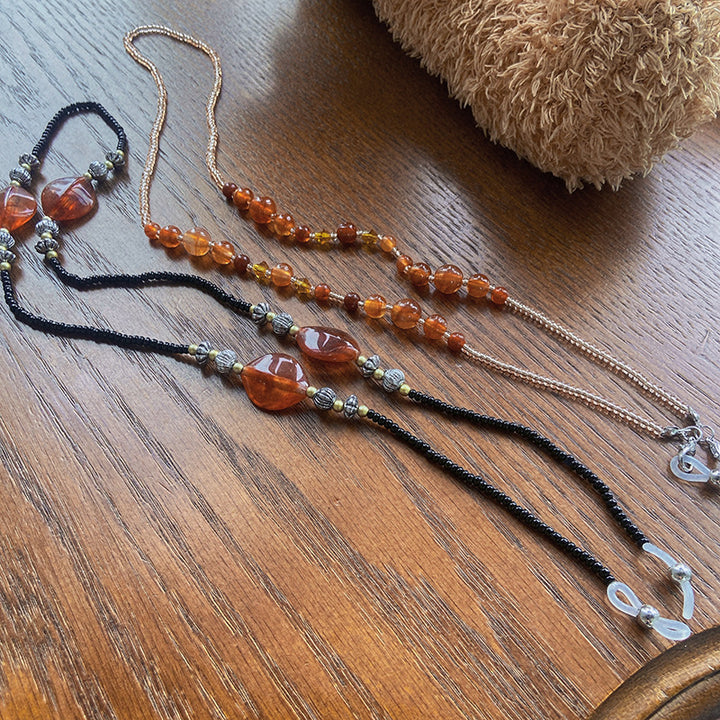 Stylish glasses holder chain with colorful accents Kalsten