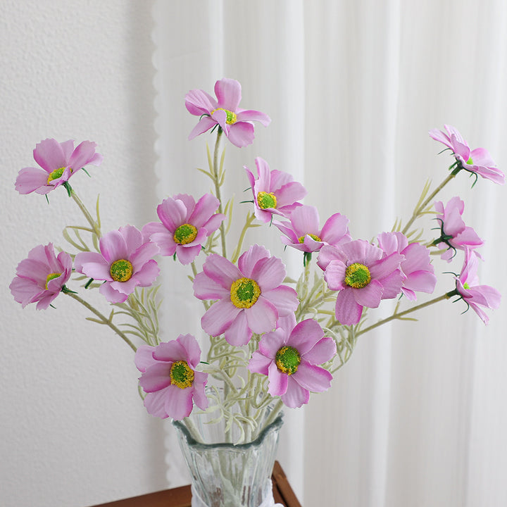 Elegant artificial flower bouquet with intricately detailed blooms