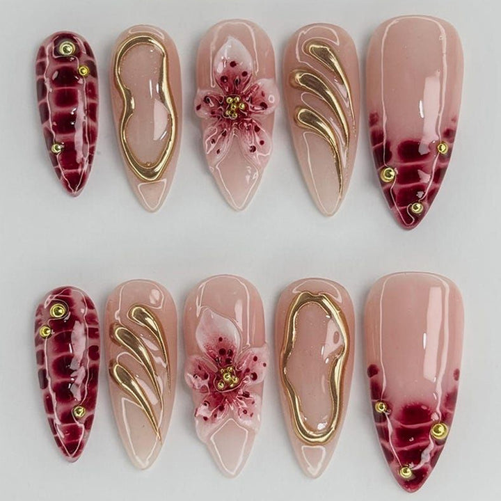 Creative nail art set with floral embellishments and glamorous accents Kalsten