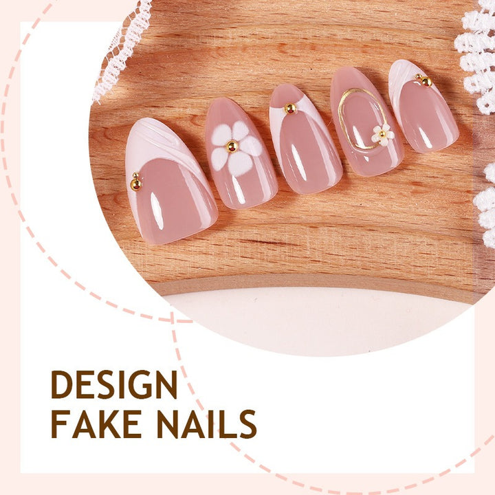 Artificial nail set with romantic floral designs and delicate accents Kalsten