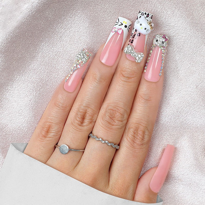 Glamorous artificial nail set with sparkling rhinestone embellishments and creative animal designs Kalsten