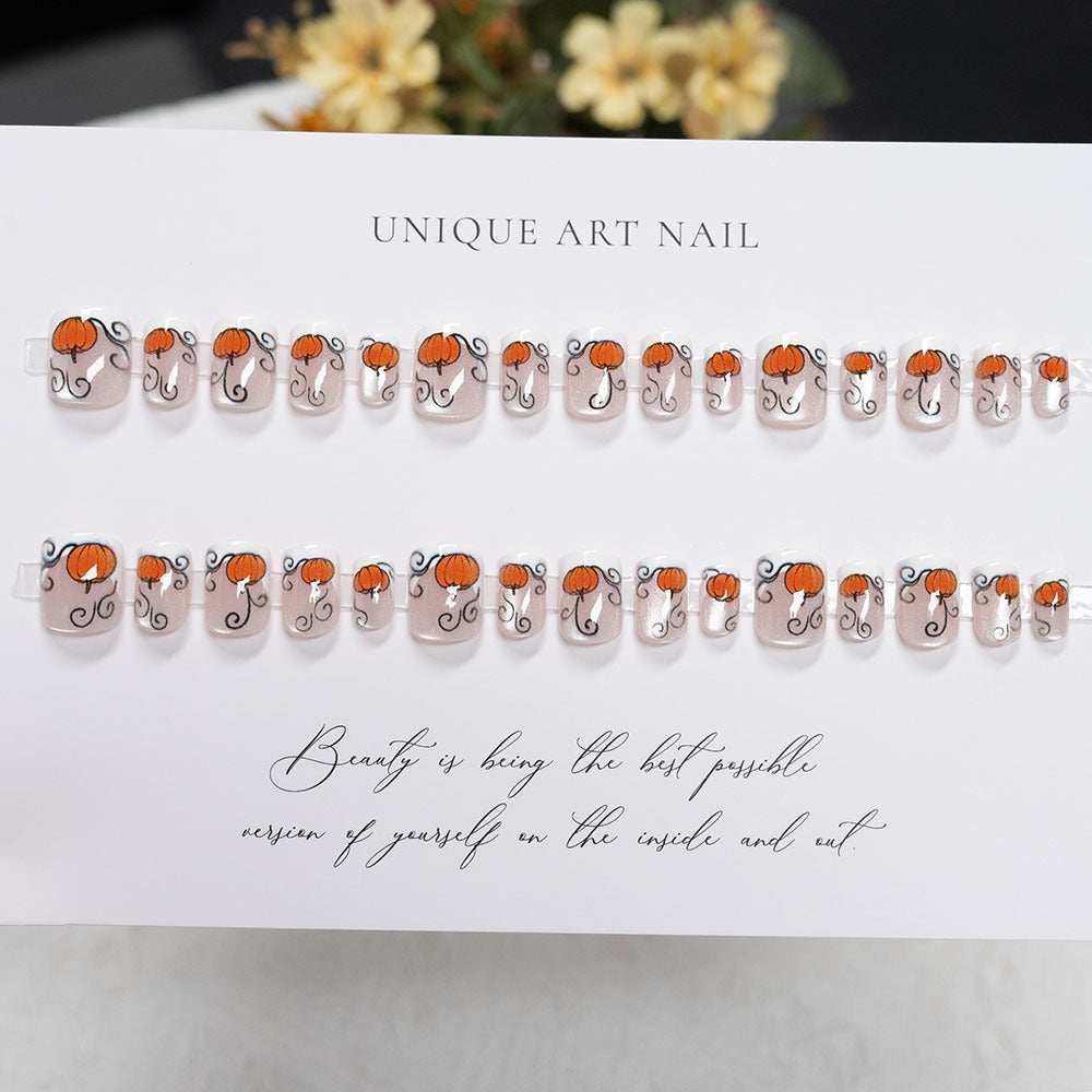 Festive Pumpkin-Themed Nail Art