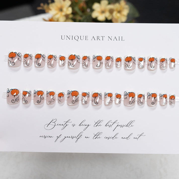 Festive Pumpkin-Themed Nail Art