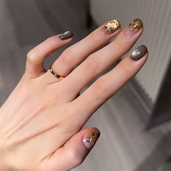 Artistic nail art with glitter accents and elegant design Kalsten