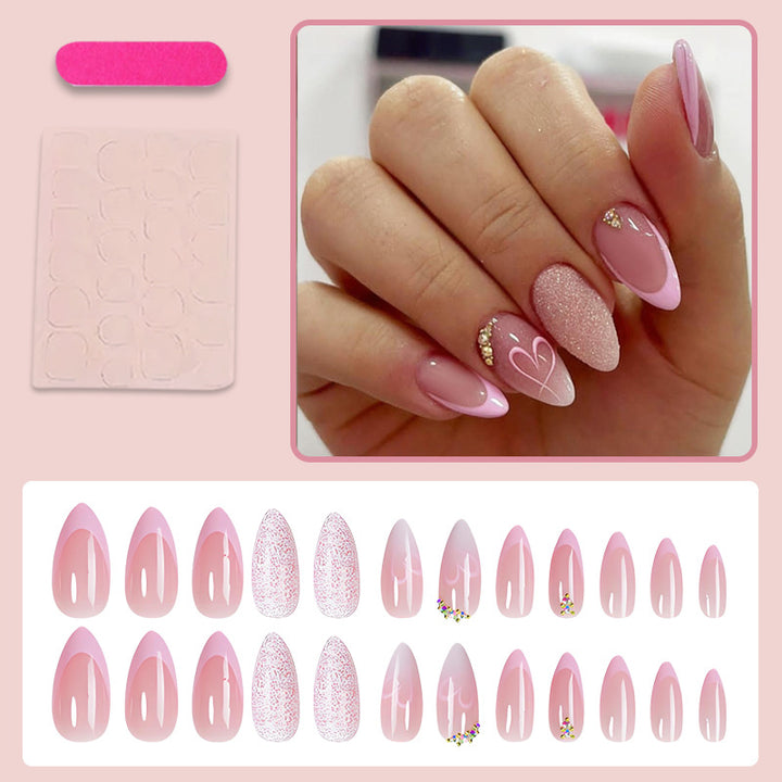 Artificial nail set with delicate glitter and heart designs Kalsten