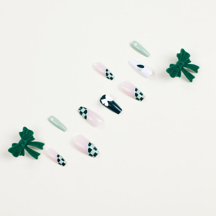 Artificial nail extensions with creative design and glitter accents Kalsten