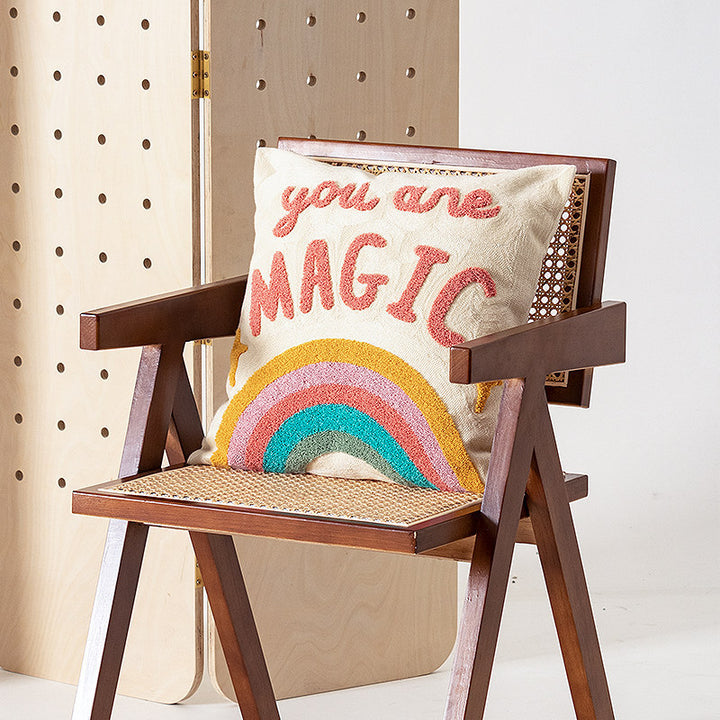 Decorative pillowcase with hand-tufted giraffe and rainbow motif