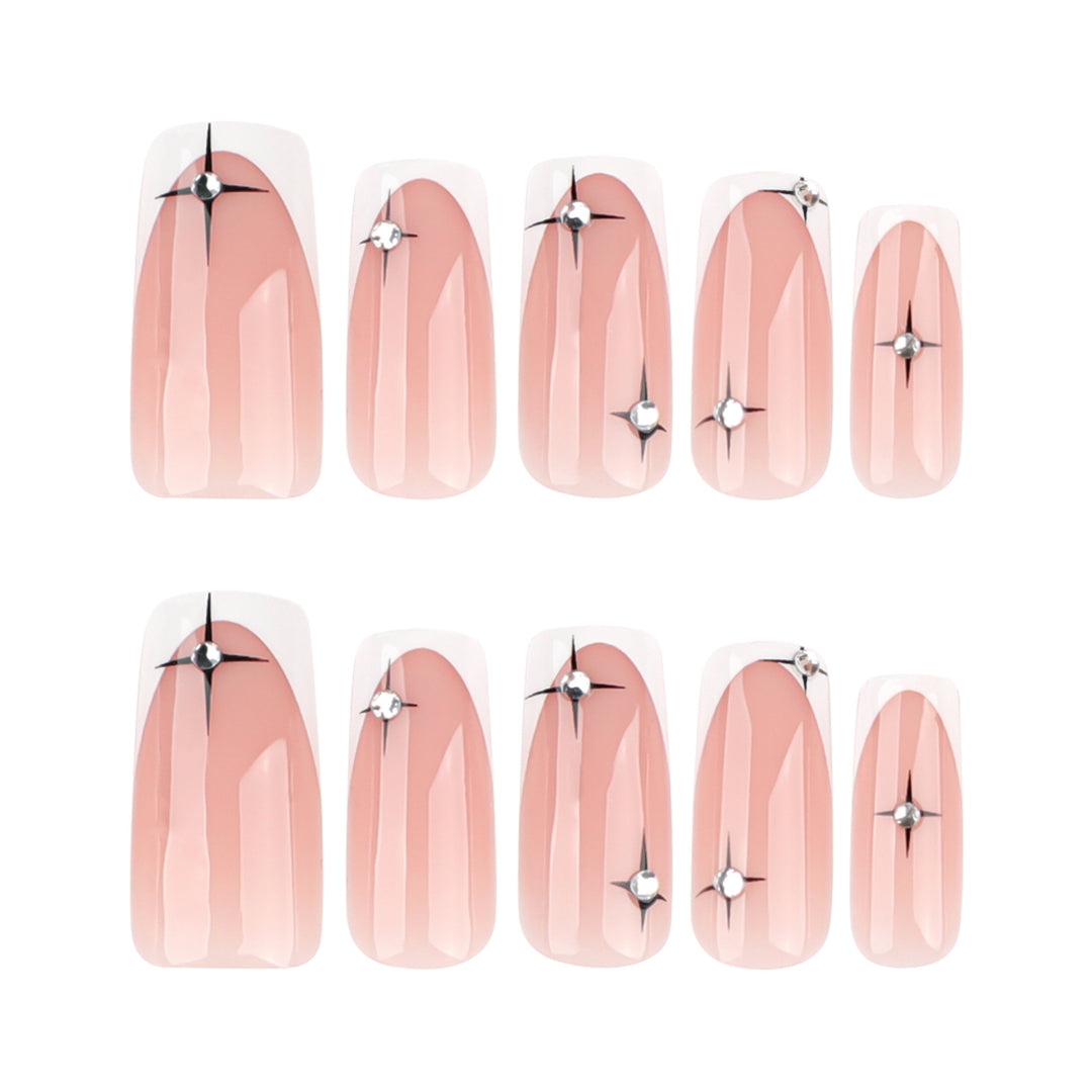 Artificial nail extensions with elegant French tip and glitter accents Kalsten