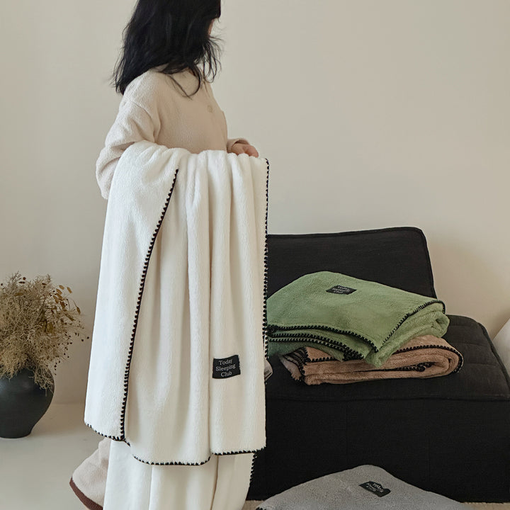 Extra soft microfleece throw blanket with decorative stitching