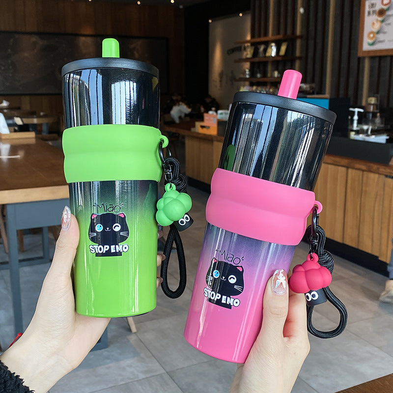 Women's playful coffee mug with silicone sleeve and integrated pendant Kalsten