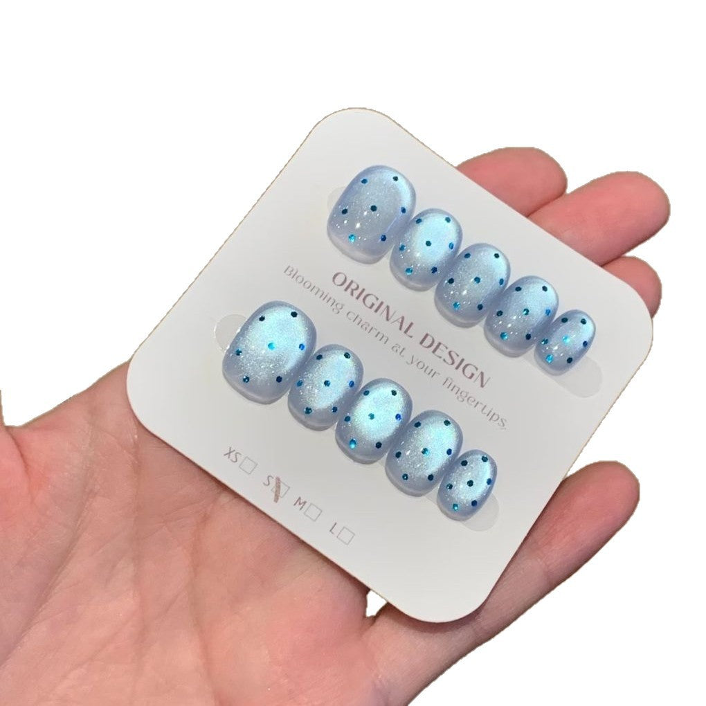 Elegant Stiletto Nail Extensions with Decorative Accents