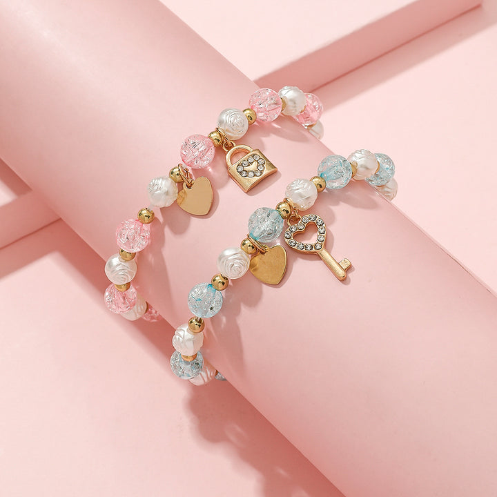 Playful bracelet set with heart and key design Kalsten