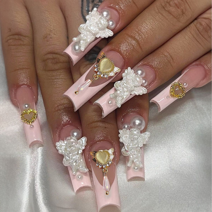 Creative acrylic nail set with delicate pearl and gloss accents Kalsten