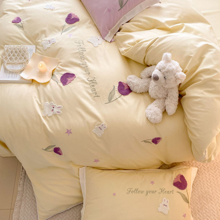Romantic cotton satin bedding set with embroidered rabbit and flower appliqués