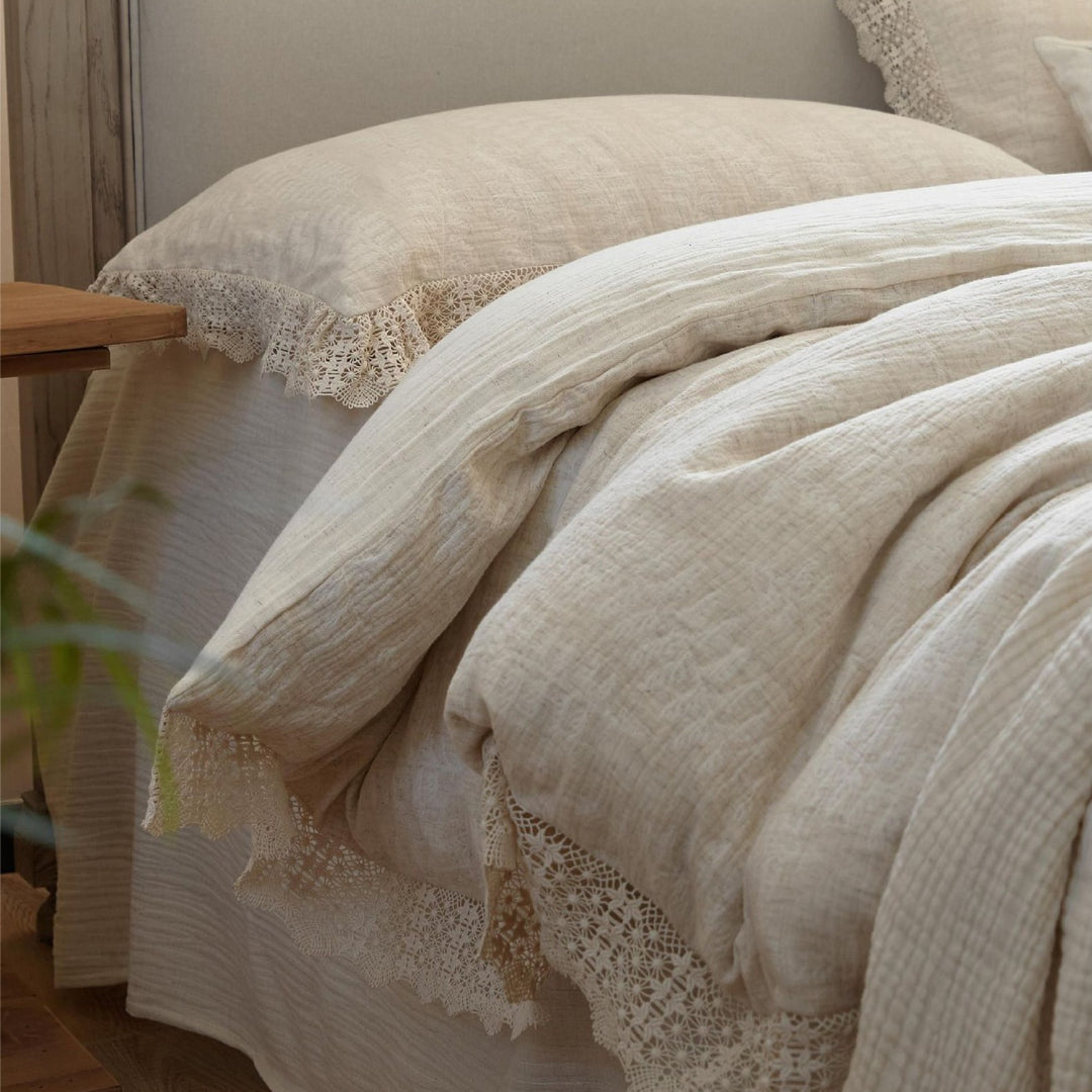 Natural linen bedding set with lace edge and decorative neck roll