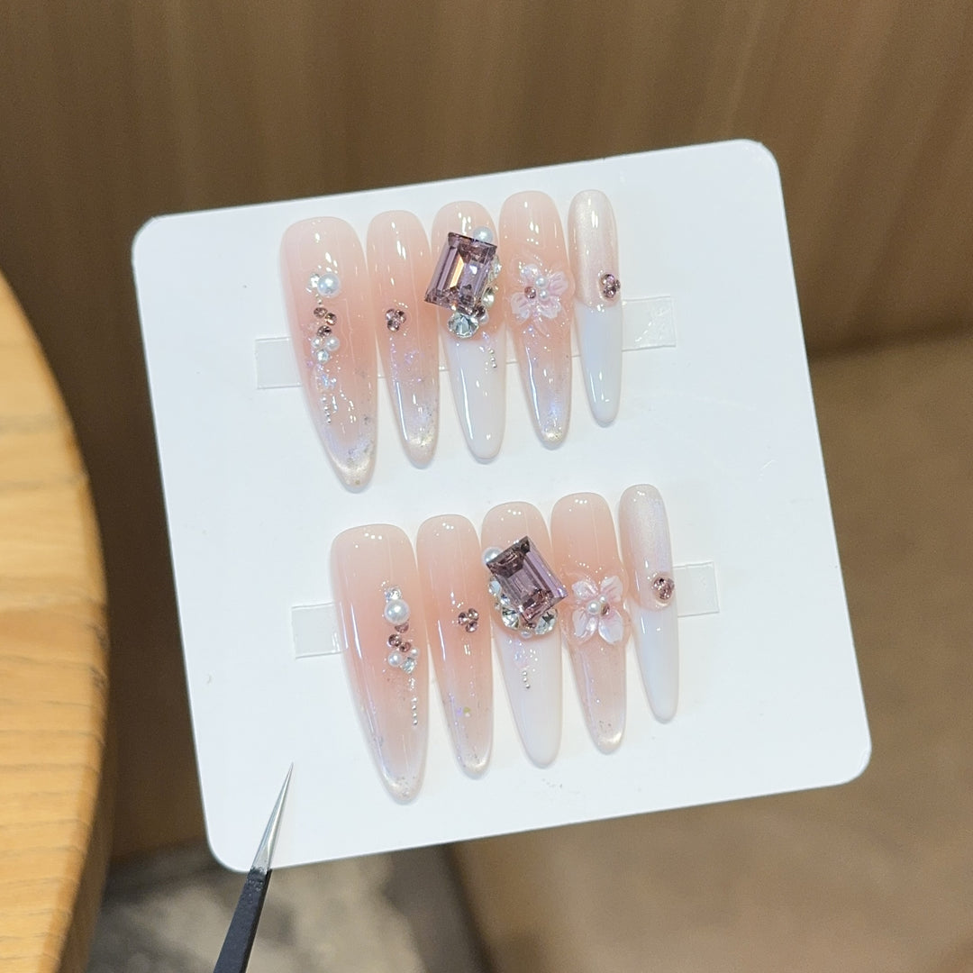 Artificial nails with elegant jewelry details Kalsten