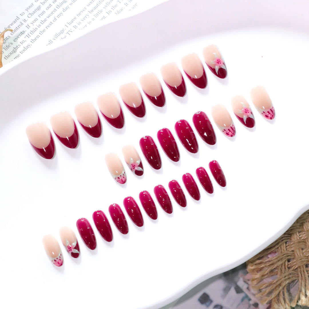 Artistic nail art with floral accents and glossy finish Kalsten