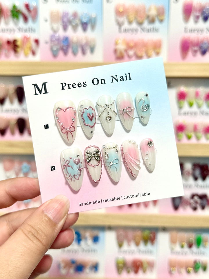 Artistic Press-On Nail Art Set with Heart and Bow Designs