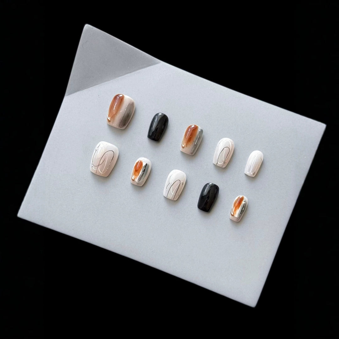 Artistic Press-On Nail Set with Marble and Glossy Finish